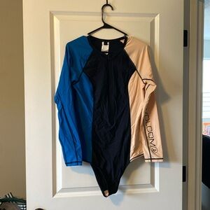 Volcom one piece rash guard swimsuit with zipper front